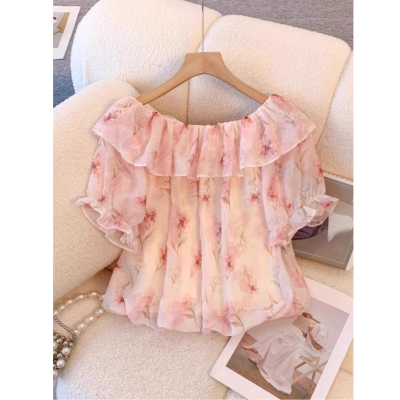 夏の太ったmmのゆったりした大きいサイズのシフォンの泡の袖のシャツの半袖の女性はやせている花を現します。|undefined