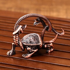 A set of alloy Four Holy Beasts, featuring Red Copper color Qilin, White Tiger, Vermilion Bird, and Black Tortoise, as well as the Four Great Divine Creatures, serves as a home decoration and craft item.