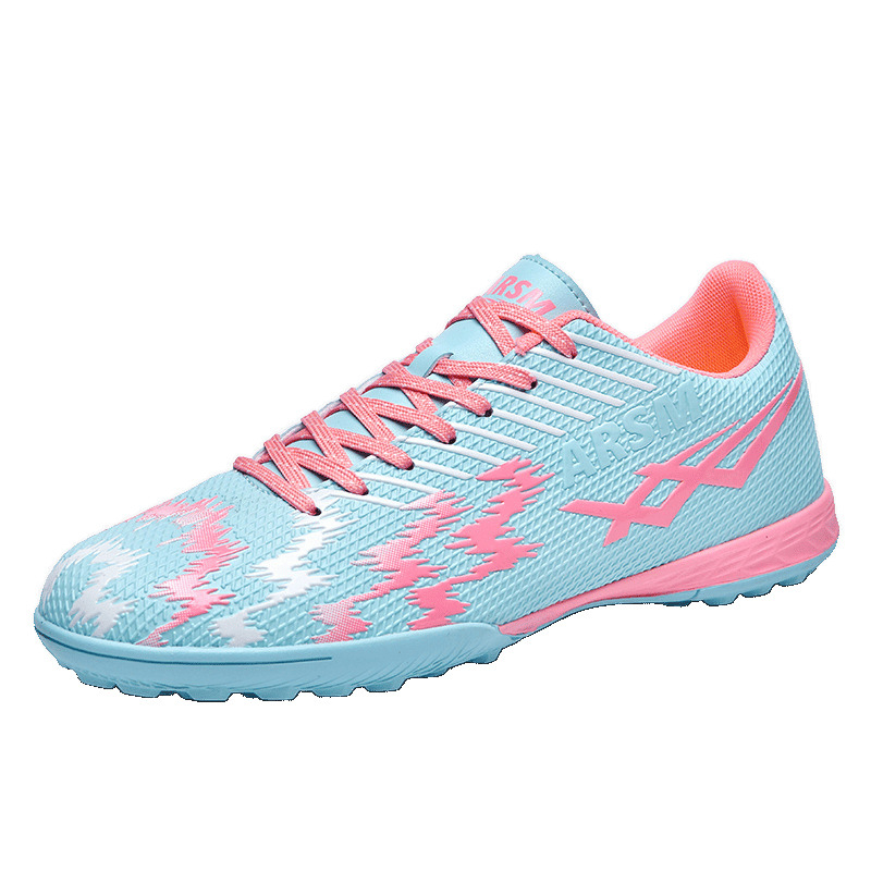 Comercio exterior transfronterizo nuevas zapatillas de fútbol deportivas bajas al aire libre para hombres y mujeres zapatillas de entrenamiento con clavos artificiales para estudiantes