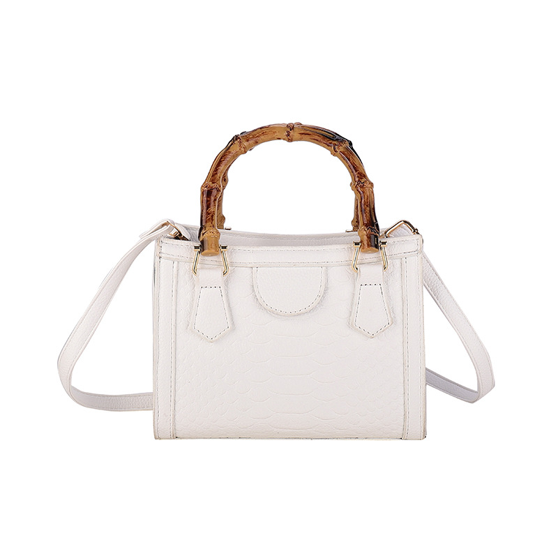 Europa y los Estados Unidos retro bolsos transfronterizos mujeres 2024 nueva moda simple bolsos de mano casuales cocodrilo mochila pequeña