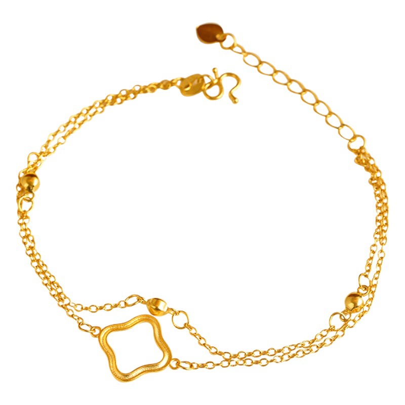 Aleación de cobre de Cercanías de moda todo partido pulsera de doble capa trébol de cuatro hojas pulsera de doble línea joyería de suministro directo de fábrica de las mujeres