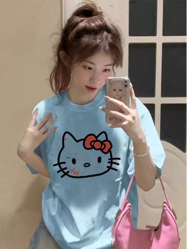 เสื้อยืดแขนสั้นผ้าฝ้ายแท้ สีน้ำเงิน สำหรับผู้หญิง ปี 2026 สไตล์ใหม่ สไตล์อเมริกัน ทรงหลวม ไซส์ใหญ่ ดีไซน์เฉพาะตัว เสื้อ Hellokitty
