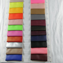 亚面弹力荧光PU服装革 四面弹力针织服装打底裤时装人造革PU面料