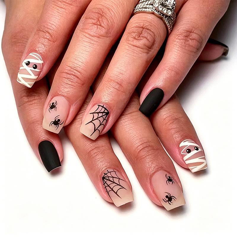 European and American minimalist Halloween press-on nails with a nude skin base color, mummy, spider, spider web, square-shaped finished nail patches European and American minimalist Halloween press-on nails with a nude skin base color, mummy, spider, spider web, square-shaped finished nail patches