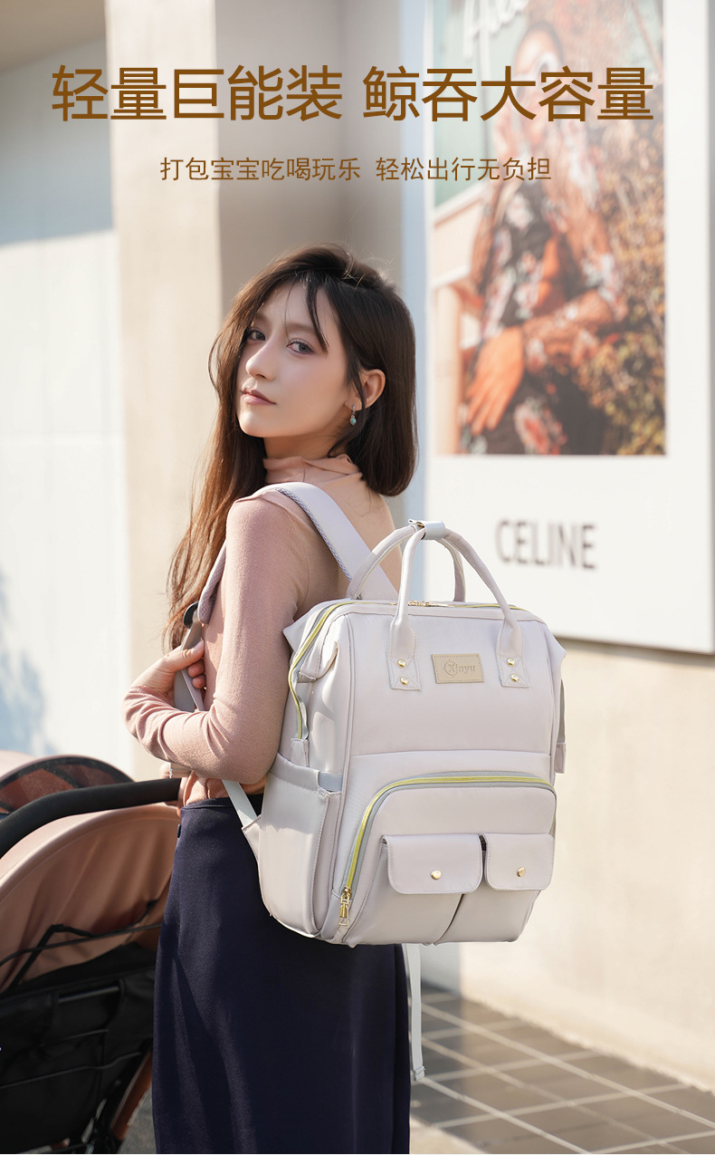 The 2025 new product is a high-end outdoor milk storage, heat preservation, large-capacity baby bag, multi-functional storage, and cross-border mommy bag undefined