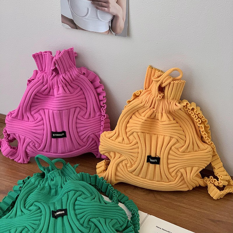 双肩包女韩国东大门个性小众设计休闲针织编织手提包抽绳手拎包包