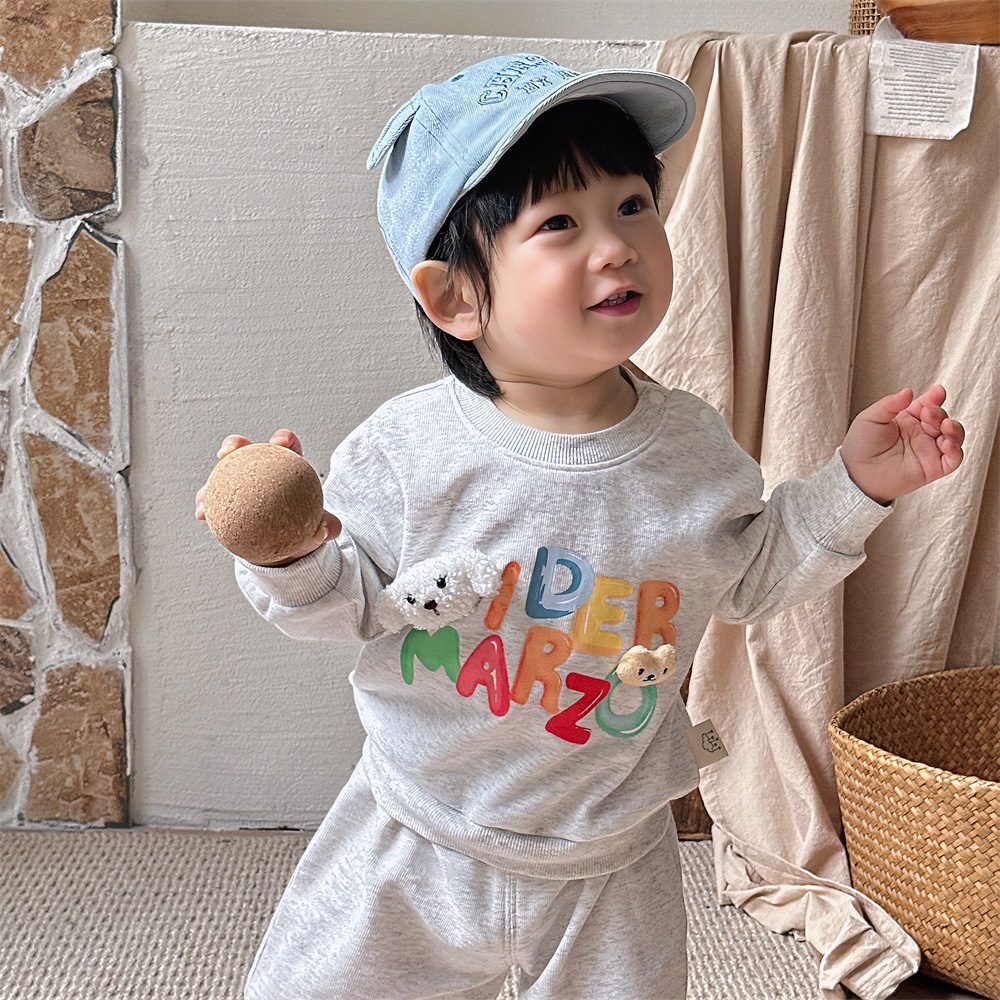 Ropa de salida para niños Ropa de primavera Ropa para niños coreanos Traje de primavera y otoño para bebés Suéter impreso para bebés Pantalones de dos piezas