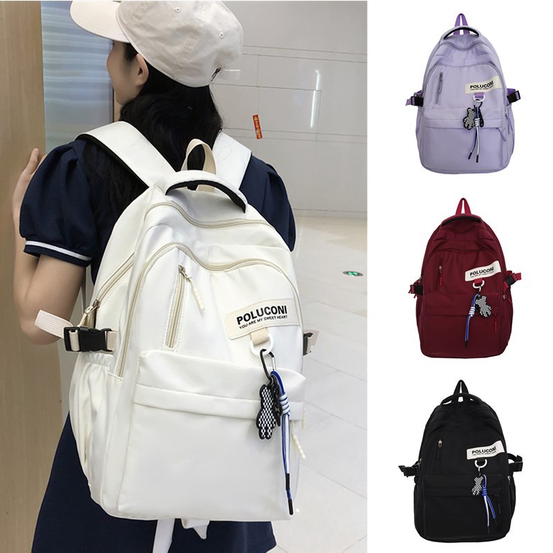 Al por mayor nueva escuela secundaria estudiante mochila hombres y mujeres de gran capacidad Moda mochila coreana casual viaje mochila