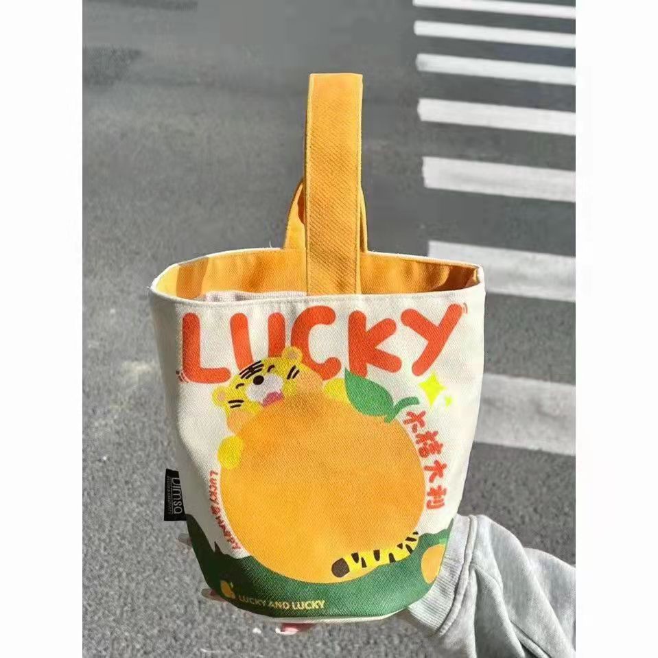 Nuevo tipo de bolso de lona gran impresión naranja italiana bolso de mano pequeño bolso de mano taza de bento para salir bolso pequeño lindo