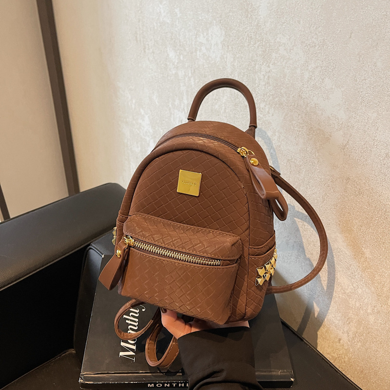 Mochila coreana de moda de estilo extranjero para mujeres simple color sólido bolso portátil de mujer 2025 nueva mochila de estudiantes de comercio exterior
