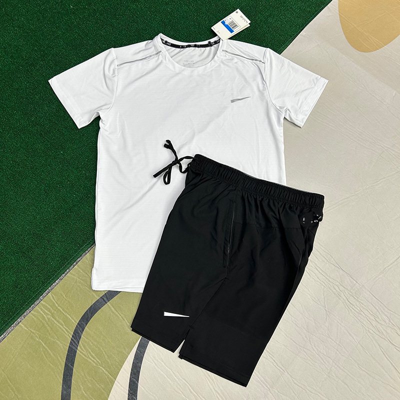 Mayorista nuevo juego de comercio exterior deportivo fitness juego de carrera rápida secado transpirable suelto ocio pantalones cortos de manga corta ropa de hombre