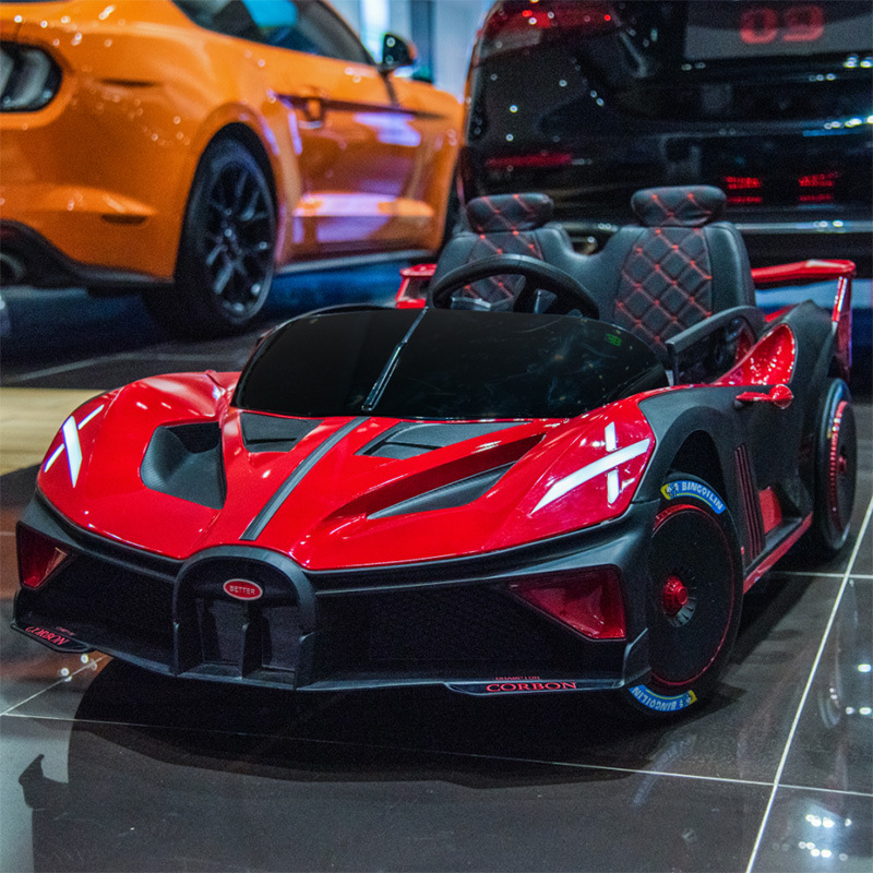 Coche eléctrico para niños coche de control remoto sentado bebé coche deportivo de cuatro ruedas entrega de una pieza coche de juguete recargable