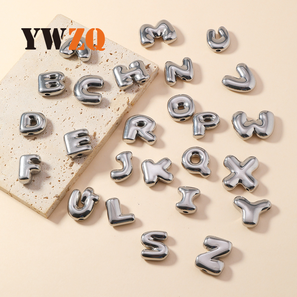 Colgante único venta cruzada de burbujas de fundición 26 collares de letras inglesas accesorios colgante DIY joyas de acero inoxidable