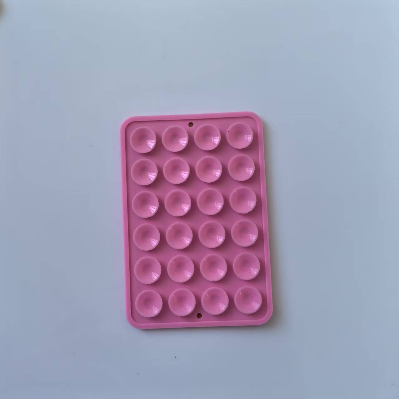 Funda de silicona antideslizante con ventosas para teléfono, 24 piezas en stock, soporte portátil móvil para teléfono, cuadrado, de silicona de una sola cara.