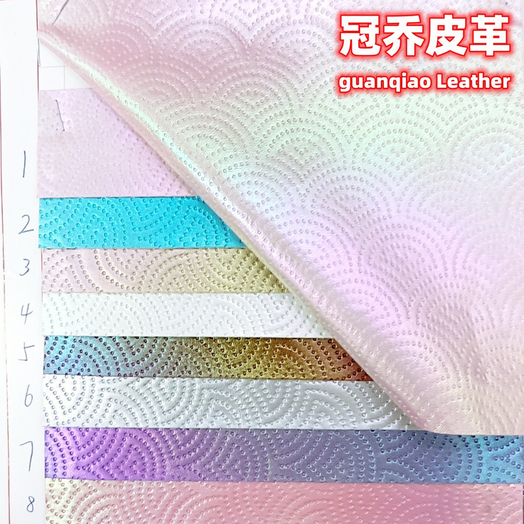 彩虹渐变孔雀纹压花PU皮革 镭射幻彩半圆形皮料 箱包饰品装饰面料