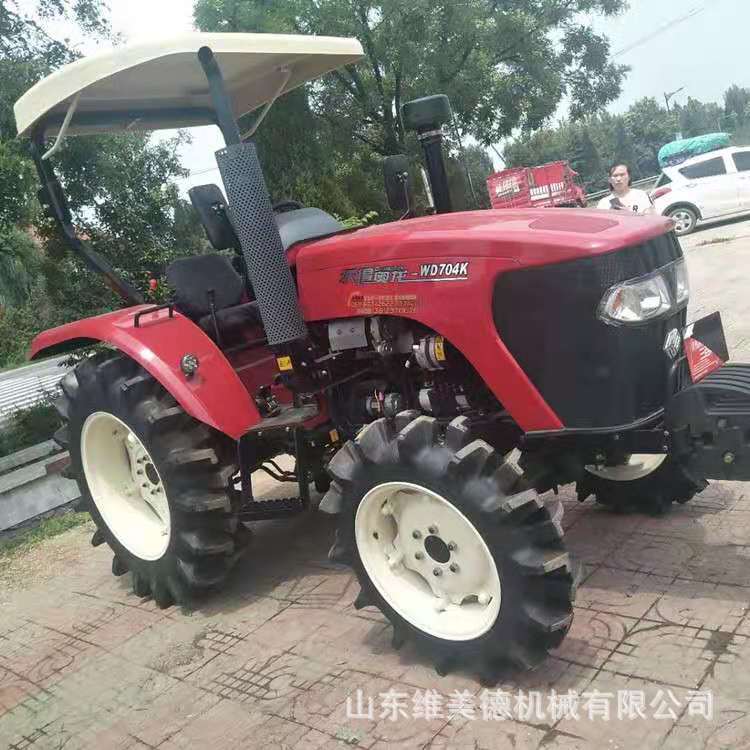 厂家供应沃得704四轮拖拉机 水旱两用四驱耕地犁地机 强压多路阀