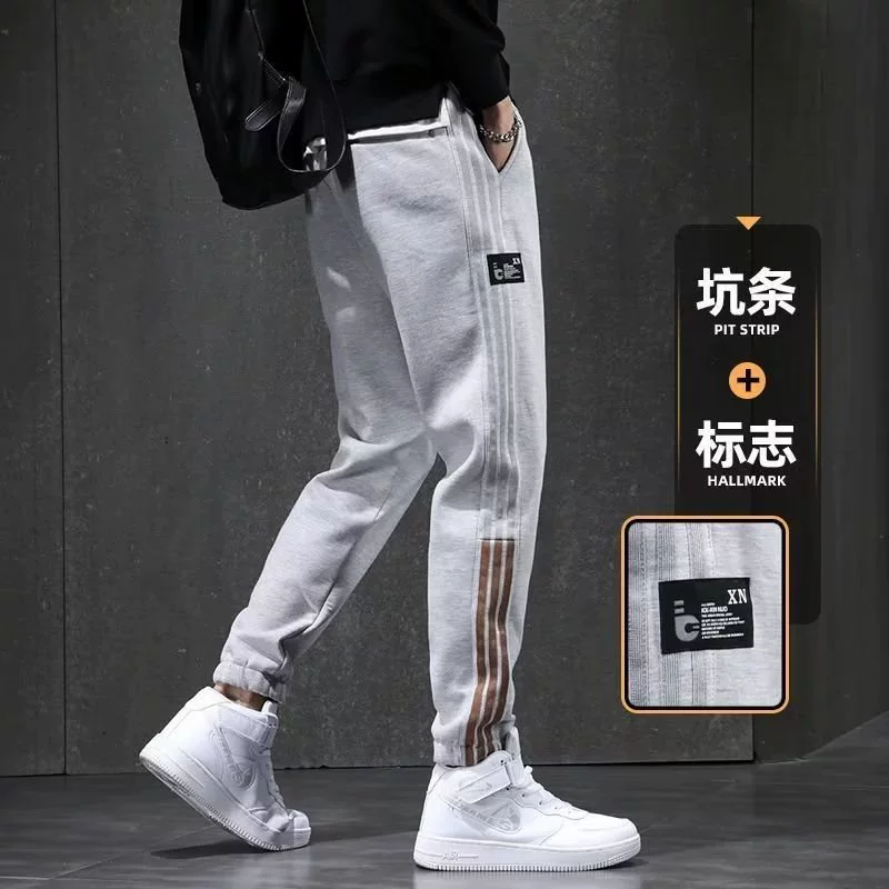 Весенние и осенние молодежные модные модные бренды прилив-укороченные брюки для ног повседневные брюки в полоску свободные мужские спортивные брюки