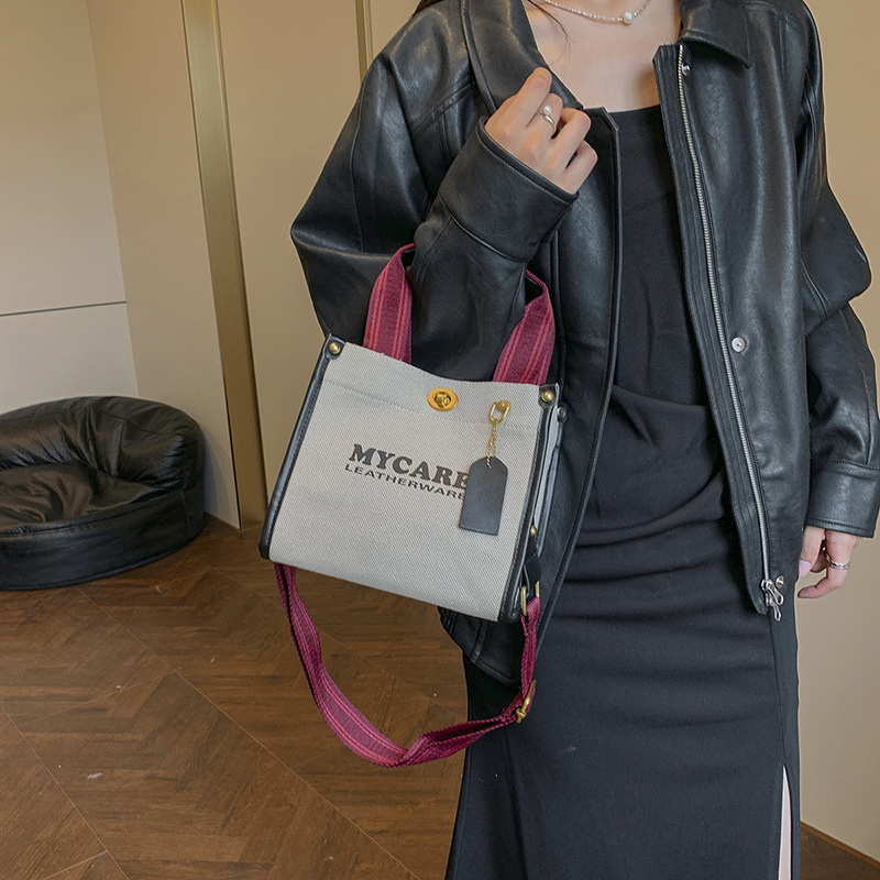 Gran capacidad de viaje al trabajo bolso de mano para mujeres 2024 nuevo lino retro color contraste mochila de hombro