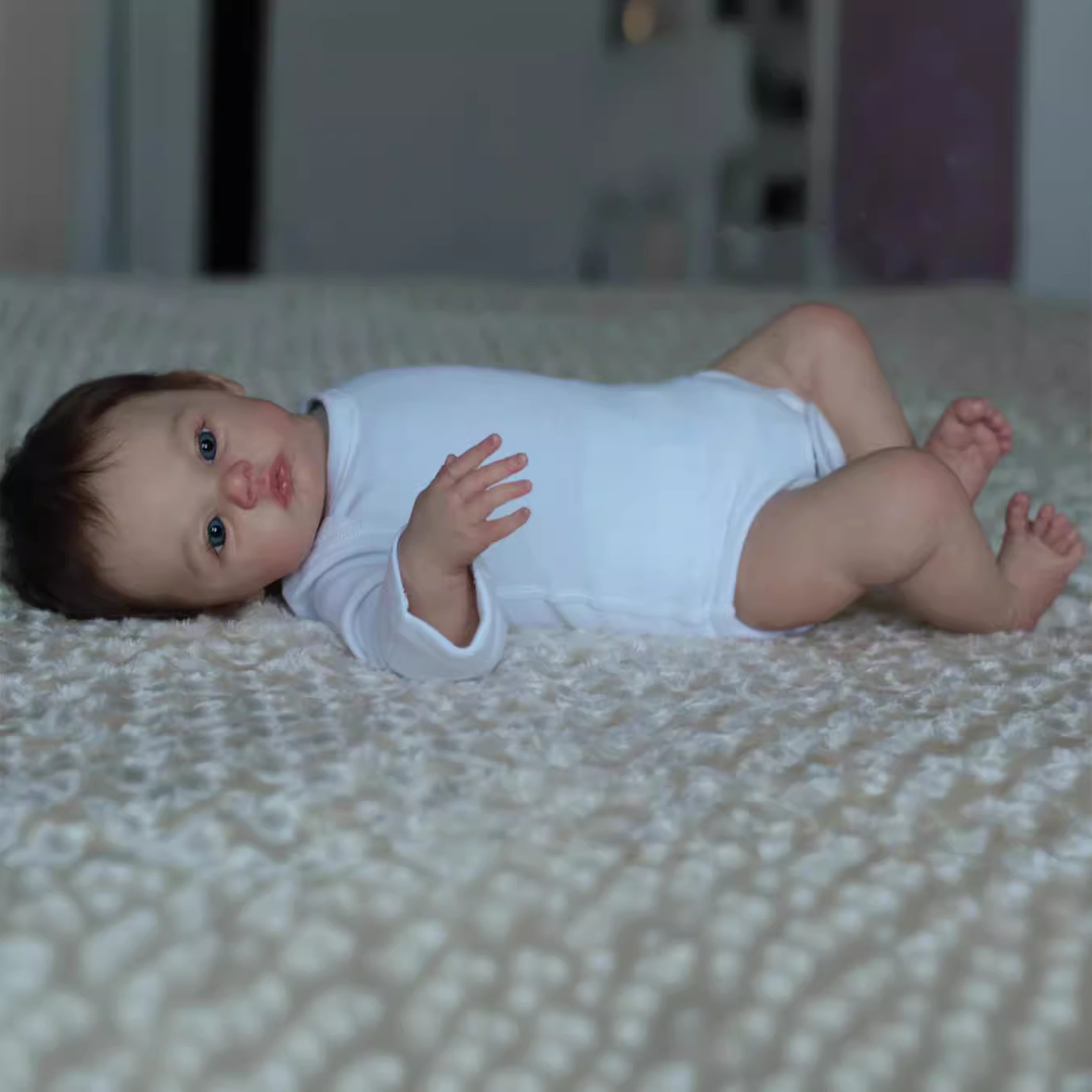 Muñeca suave de nacimiento familiar muñeca pesada de simulación de niños CM regalo de cumpleaños transfronterizo 45 bebés de venta caliente