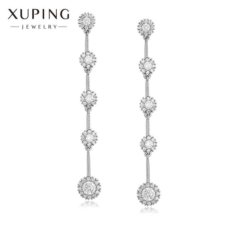 Xupin joyería aleación con incrustaciones pendientes de girasol temperamento femenino largo borla pendientes de hadas joyería al por mayor