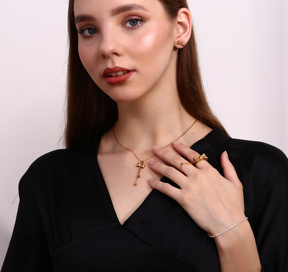 Model Show Stainless Steel Bow Knot Necklace Earrings Set