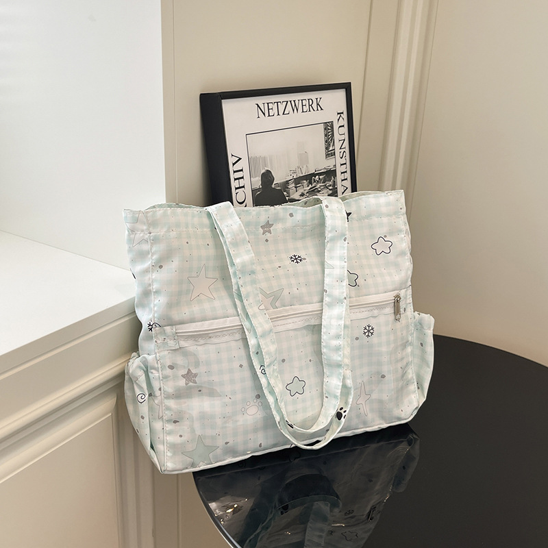 Bolso japonés simple y versátil transparente pequeño fresco estampado dulce 2025 niña dibujos animados leche huhutote bag