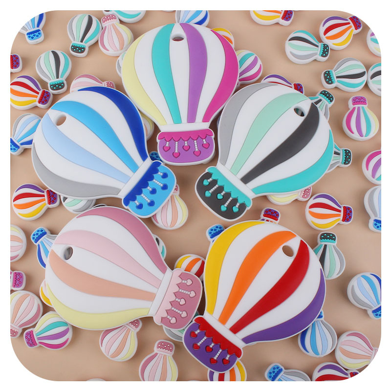 Bebé de dibujos animados colorido globo de aire caliente de silicona teether stick juguete entrenamiento del bebé dientes de molienda palo