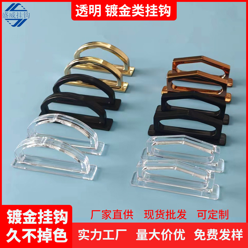 Gancho chapado en oro fábrica al por mayor caja de embalaje de plástico gancho de hebilla triangular agujero de avión caja de color gancho de plástico transparente
