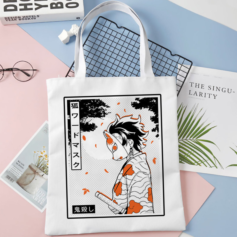 Comercio exterior transfronterizo Demon Slayer impresa bolsa de lona Harjuku bolsa de hombro bolsa de compras portátil de moda para estudiantes
