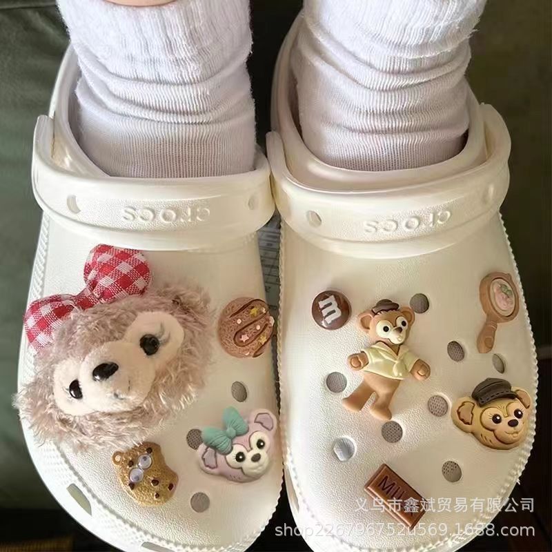 Muñeca de dibujos animados felpa estrella Delu agujero zapatos accesorios piel bola creativa nuevos zapatos decorativos hebilla agujero zapatos Accesorios