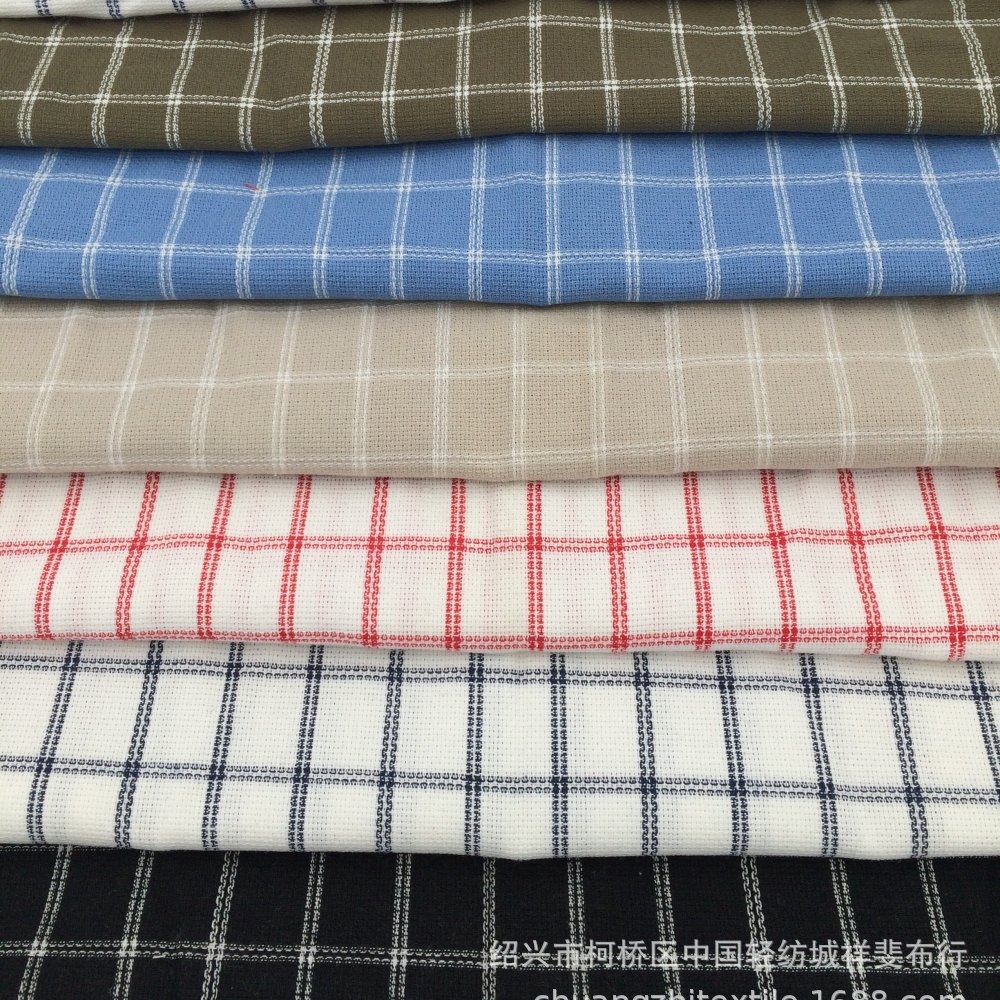 现货供应7色家纺面料色织格子提花布先染布服装布南通织布厂