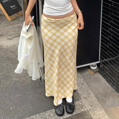 法式格纹泡泡肌理包臀鱼尾半裙不规则新款垂坠感飘逸修身A字长裙