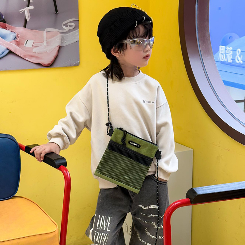 Bolso para niños coreano 2025 nueva moda moda cool bebé mochila accesorios para niños fuera mochila