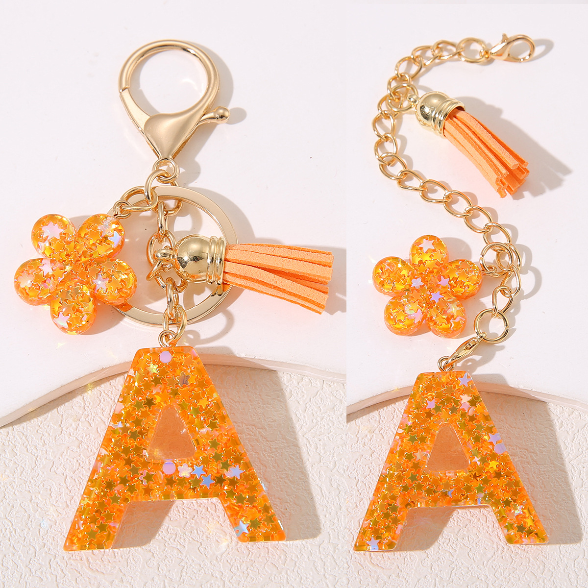 Mayorista Amazon Stanley Cup Chain Keychain Joyería de goteo de gel sequilla flores letras de estrellas llavero mujer