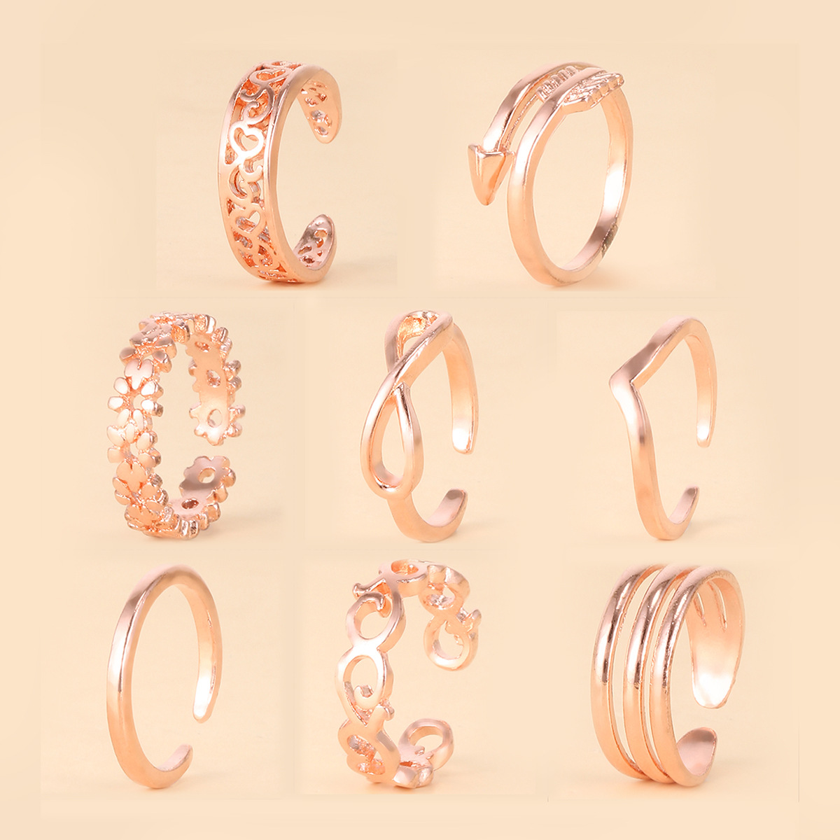 Anillo de pie de playa de las mujeres europeas y americanas de dedo de Pie ajustable abierto 8 piezas múltiples 8-palabra traje de flecha Anillo de pie anillo de cola