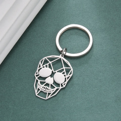 Wholesale Cross-border Bestselling Titanium Steel Hollow Skull Head Keychain Personality Trendy Stainless Steel Keychain