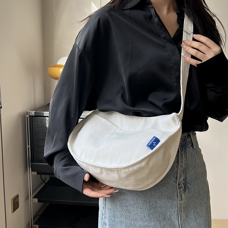 Túi xách nữ sinh viên mua sắm xuân hè túi đeo chéo phiên bản Hàn Quốc túi vải canvas trường học văn học đơn giản và đa năng