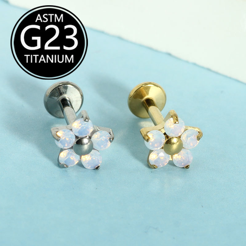 Silver pointed spike labret stud material detail
