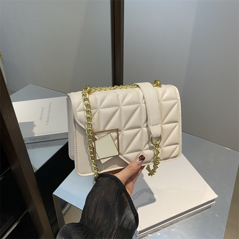 Línea bordada de color sólido 2024 invierno nueva moda moda moda retro ocio simple cadena mochila bolso de hombro