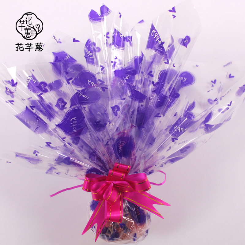 圣诞平安果包装纸鲜花包装透明玻璃纸英文桃心70#花束礼品包装纸