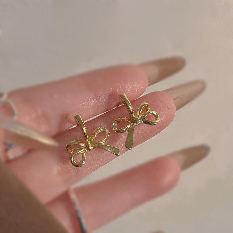 Pendientes de metal de alta gama, diseño minimalista y moderno, para mujer 2024, suministro al por mayor