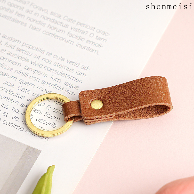 Keychain de cuero pu transfronterizo estilo simple de mano hebilla de cuero logotipo imprimible colgante de cuero llavero para hombres y mujeres