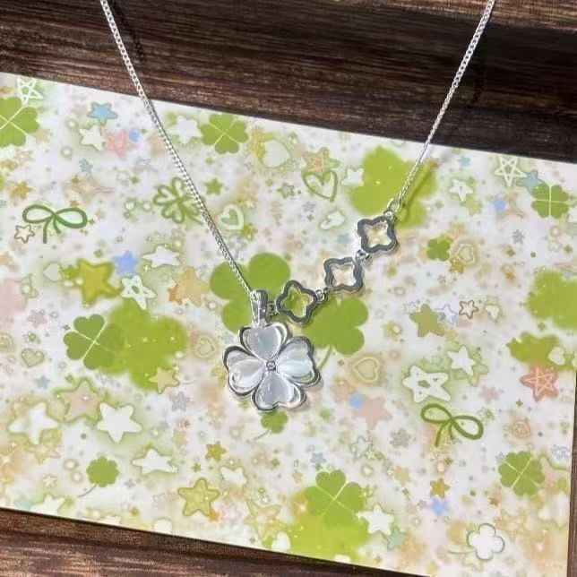 New white hollow lucky four-leaf clover necklace for women, exquisite and versatile, a niche gift for best friends and girlfriends