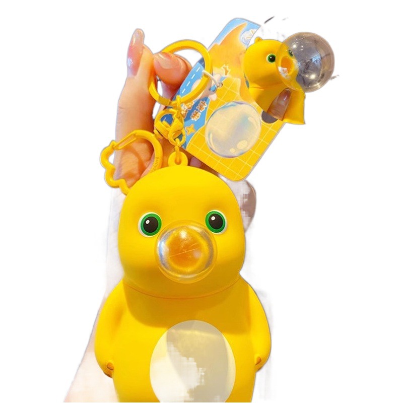 Online Celebrity schoolbag adornos genuino descompresión burbuja leche dragón llavero femenino exquisito creativo pellizcar música colgante clave