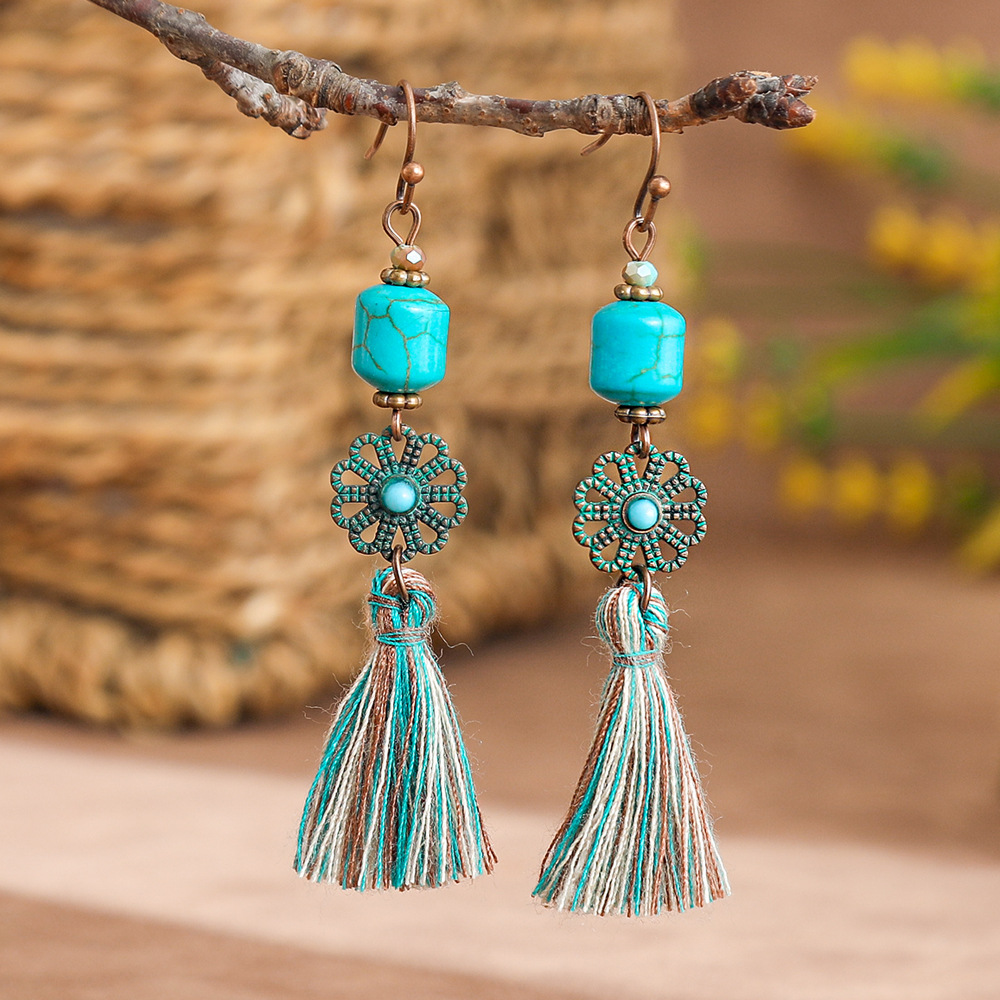 New vintage leaf pendant earrings women's fashion hollow carved alloy tassel earrings European and American fashion jewelry batch
