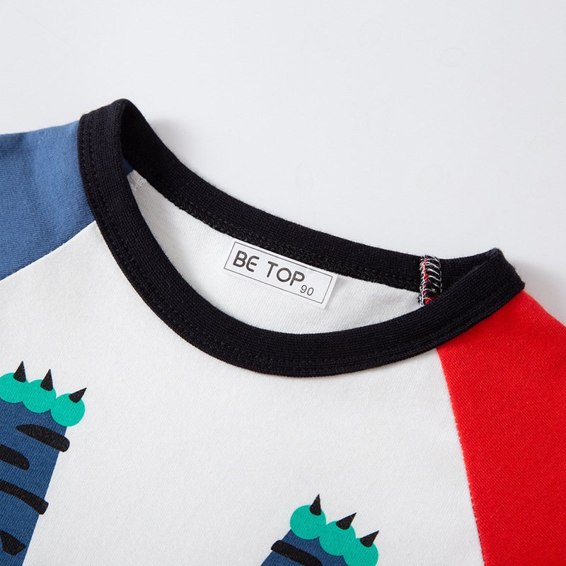 Camiseta de manga larga para niños con estampado de dibujos animados, versión coreana otoño 2025, ropa infantil de otoño, algodón puro para bebés, venta al por mayor.