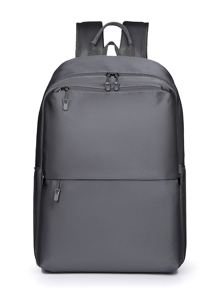 Mochila de negocios simple de hombre transfronteriza, mochila de estudiantes ligera transfronteriza de gran capacidad, mochila de moda a prueba de salpicaduras