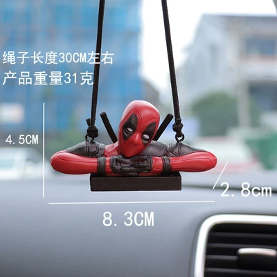 Book Little Naughty Car Accessories | Car hanging - lying-on-black-wood-chips