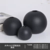 Rough pottery ball black suit