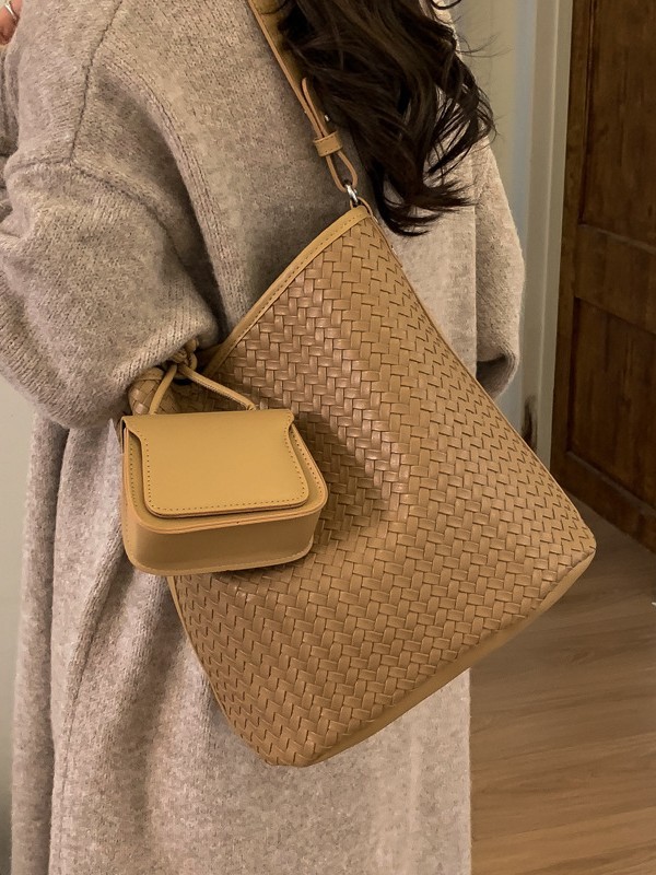 Diseño coreano de nicho de tejido bolso de cubo de agua de mujer nueva textura de alta calidad de hombro versátil bolso de tramo inclinado